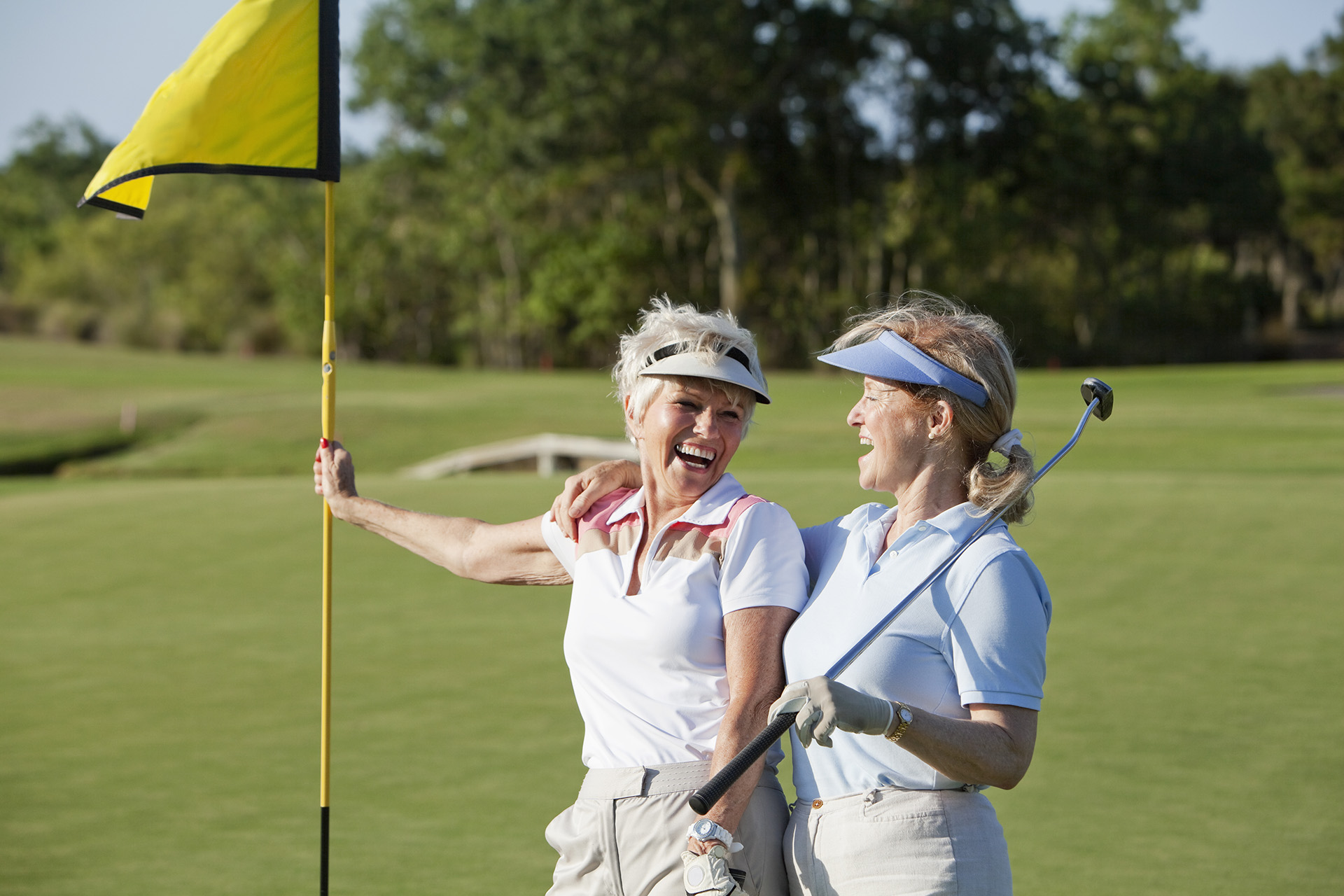 Ladies' playing golf at Addison Reserve in Florida