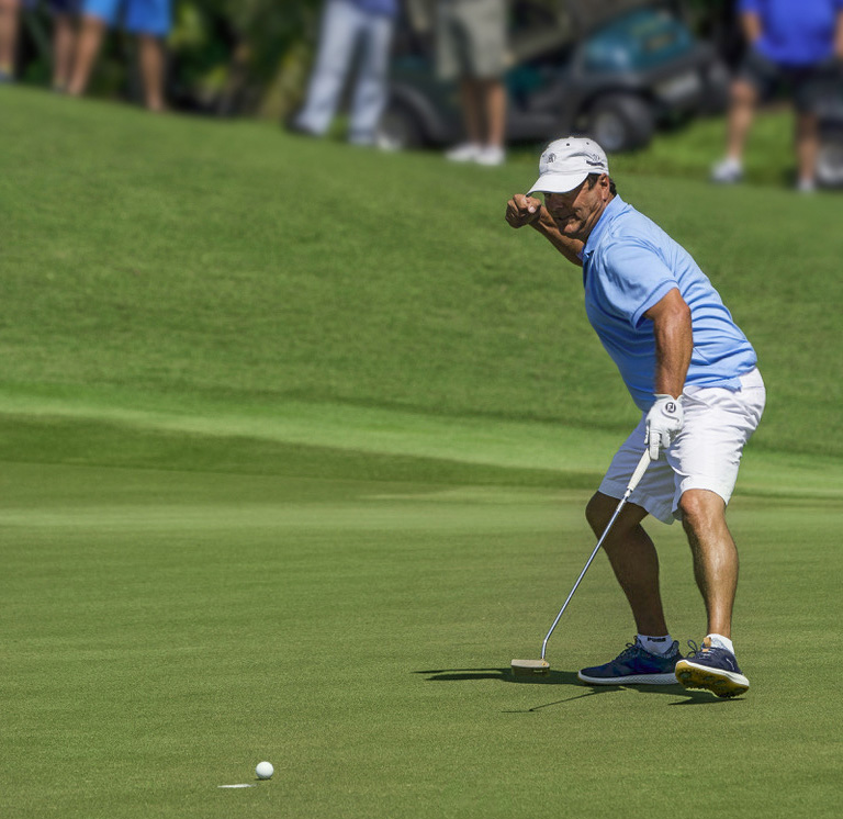 Man playing golf at Addison Reserve in Florida