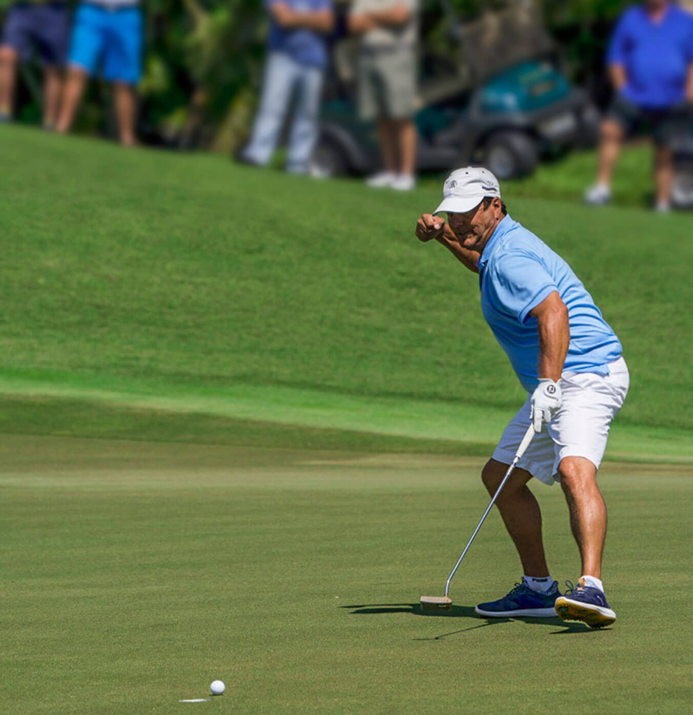 Man celebrating putt at Addison Reserve in Florida